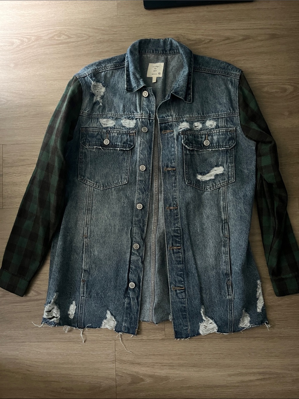 Women's Distressed Denim Jacket with Green Plaid Sleeves